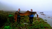 2 Students Cleaning the Ocean